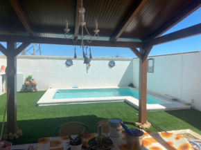 Buhardilla andaluza con piscina compartida